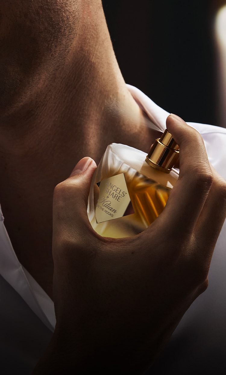Man spraying perfume