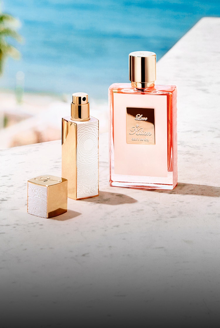 Love, don't be shy perfume and its travel case